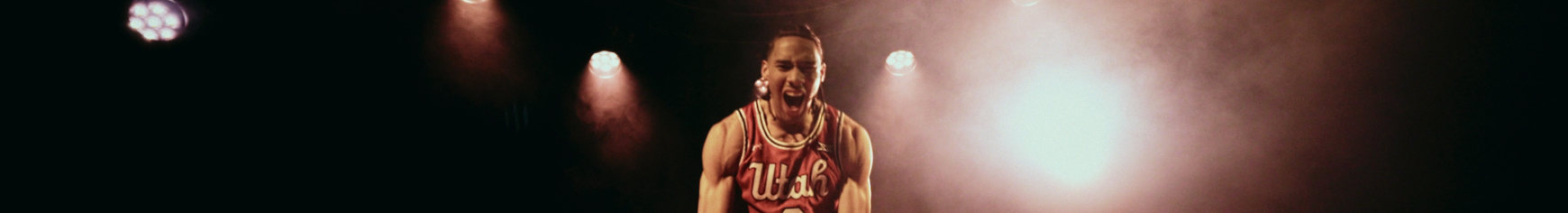 Athlete in stage lighting